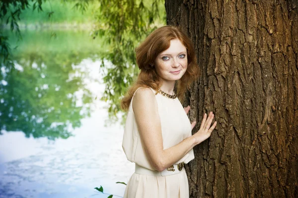 Portrait of redhead girl on nature — Stock Photo, Image