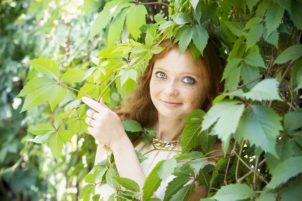 Portrait of redhead girl on nature — Stock Photo, Image