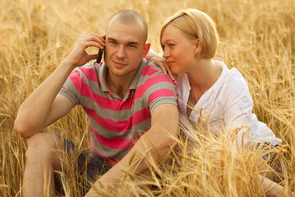 Couple with a mobile phone — Stock Photo, Image