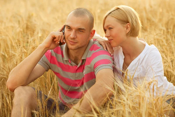 Couple with a mobile phone — Stock Photo, Image