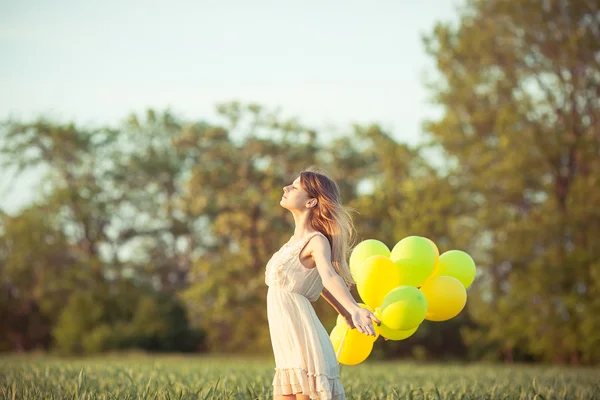 Girl with baloons — Stock Photo, Image