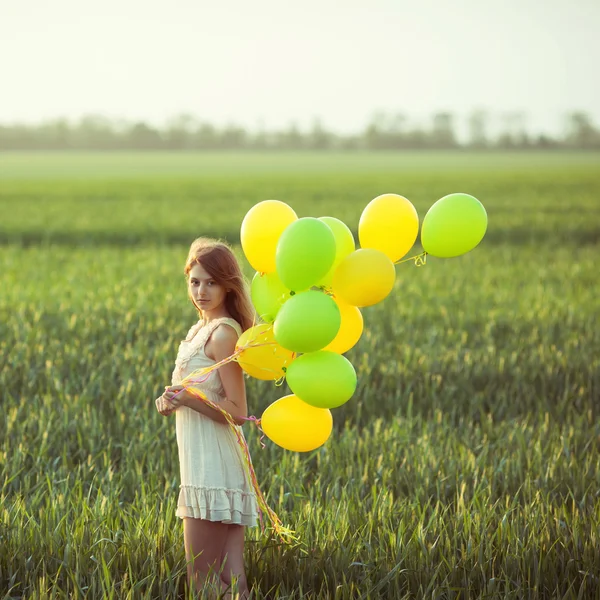 Ragazza con palloncini — Foto Stock