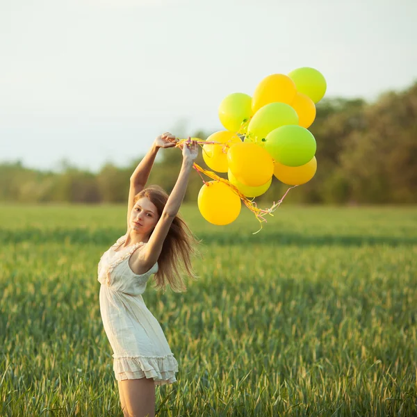 Chica con globos Fotos De Stock Sin Royalties Gratis