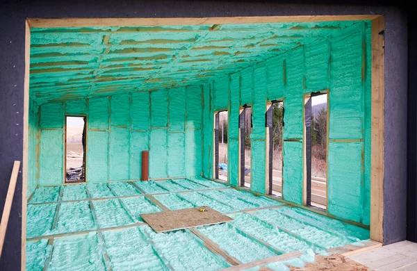 Wooden frame house insulated by polyurethane foam. — Stock Photo, Image