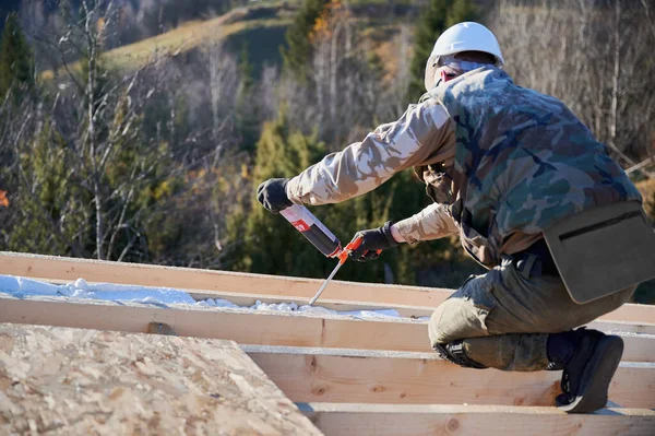 Male Builder Doing Thermal Insulation Roof Wooden Frame House Man — Foto de Stock