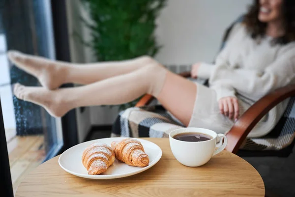 Place Croissants Cup Tea Table Cropped View Young Womans Legs — Stockfoto