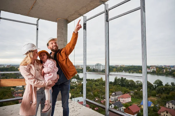 Woman Holding Daughter Husband Pointing Something Construction Site Family Child — 图库照片