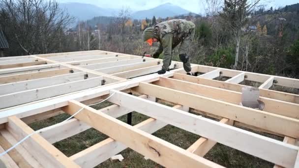 Man Worker Building Wooden Frame House Pile Foundation Carpenter Hammering — Wideo stockowe