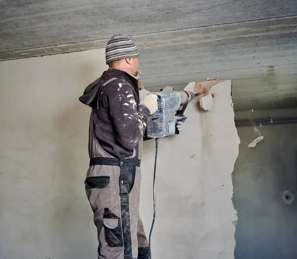 Rear View Professional Builder Hat Workwear Destroying Upper Third Wall — Foto de Stock