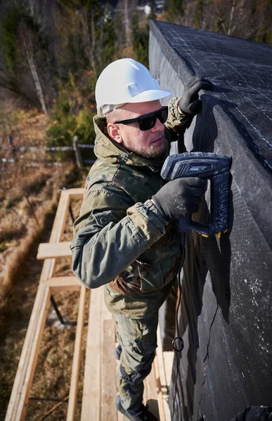 Male Builder Installing Waterproof Membrane Wall Future Cottage Man Worker — Foto Stock