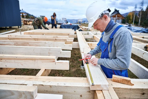 Man Worker Building Wooden Frame House Pile Foundation Carpenter Using — Foto Stock