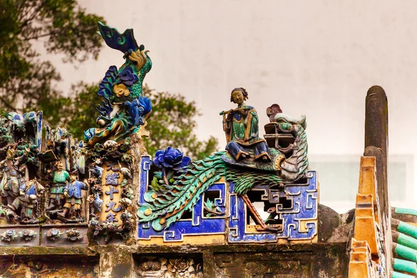 Telhado de porcelana Figurinas chinesas, Flutista, Man Mo Temple Hong — Fotografia de Stock