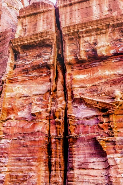 Rose Red Rock Tomb Street of Facades Petra Jordan.  Built by Nabataens in 200 BC to 400 AD Canyon walls create many abstracts close up