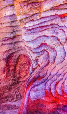 Red Blue Rock Abstract Petra Jordan  Built by Nabataens in 200 BC to 400 AD Canyon walls create many colorful abstracts close up
