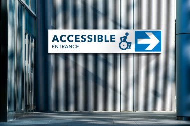 Accessible Entrance Sign at Exterior Building for Wheelchair and Handicap Person. Architecture Design to Service as Privileges for Disability people.   clipart