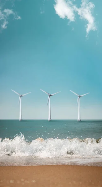 Carbon Neutral and ESG Concepts. Carbon Emission, Clean Energy, Wind Energy. Sustainable Resources, Environmental Care. Sand Beach and Wave on Sunny Day with Blurred Wind Turbine in background.