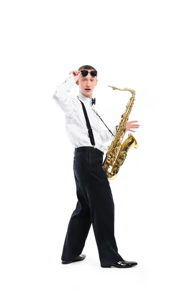 Young man holding saxophone — Stock Photo, Image