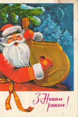 Müzik aleti banduralı Noel Baba
