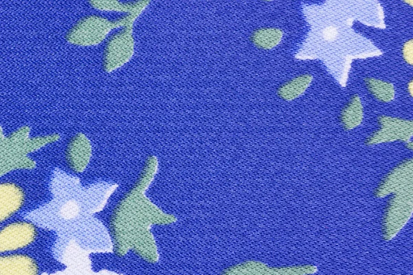 Текстура синей цветочной ткани — стоковое фото