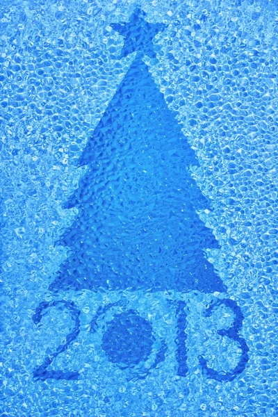 Christmas tree crystal blue background — Stock Photo, Image