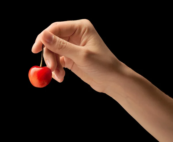 一只手上的一个甜樱桃。 — 图库照片