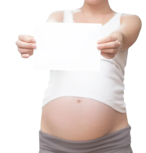 Pregnant woman with paper — Stock Photo, Image