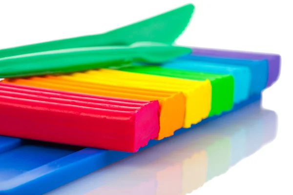 Color children's plasticine on a white background — Stock Photo, Image