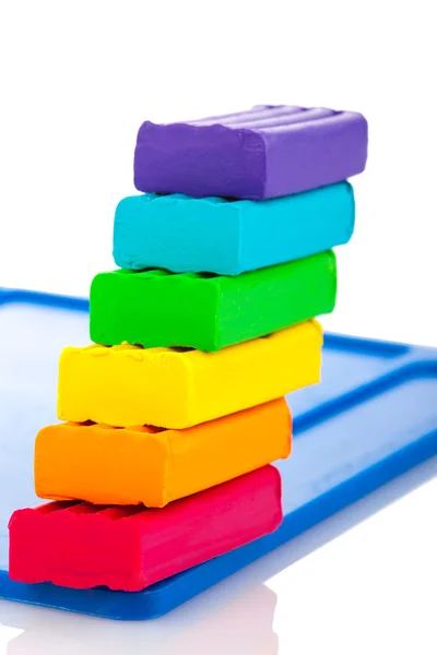 Color children's plasticine on a white background — Stock Photo, Image