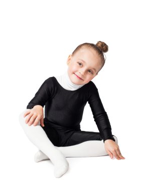 Beyaz tenli şirin küçük kız jimnastikçi kız portresi.