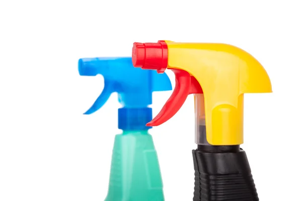 Hand squirting a bottle of cleaning spray — Stock Photo, Image