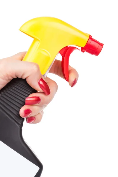 Hand spritzt eine Flasche Reinigungsspray — Stockfoto