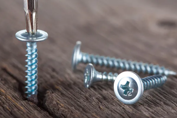 Screws on a wood — Stock Photo, Image