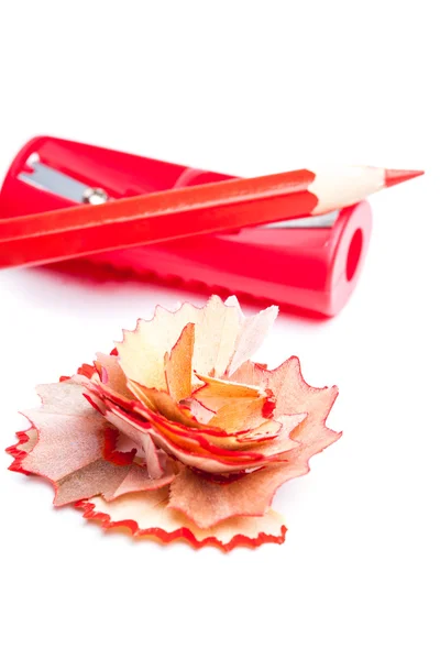 Sacapuntas y lápiz rojo —  Fotos de Stock