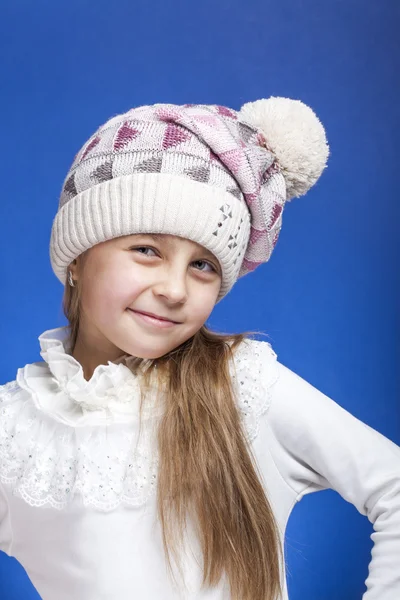 Adorable girl in winter hat. Stock Image