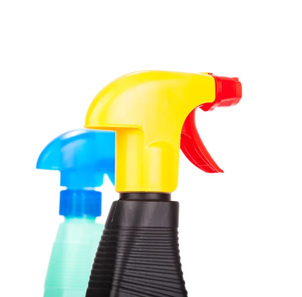 Mano chorreando una botella de spray de limpieza — Foto de Stock