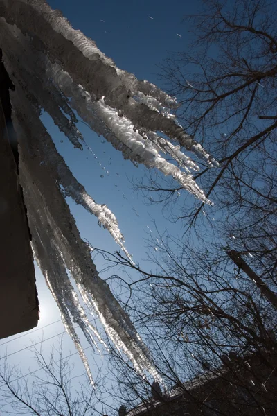 Icicle in industrial town — Stock Photo, Image