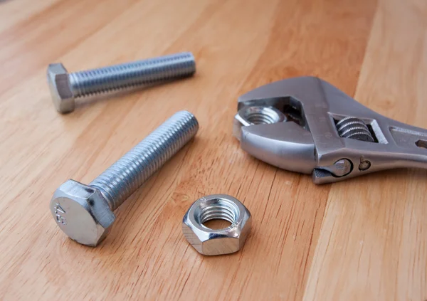 Wrench tool and nut — Stock Photo, Image
