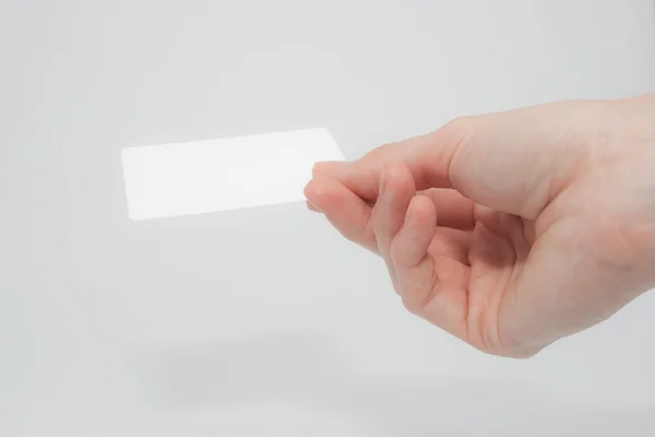 Hand with blank card — Stock Photo, Image