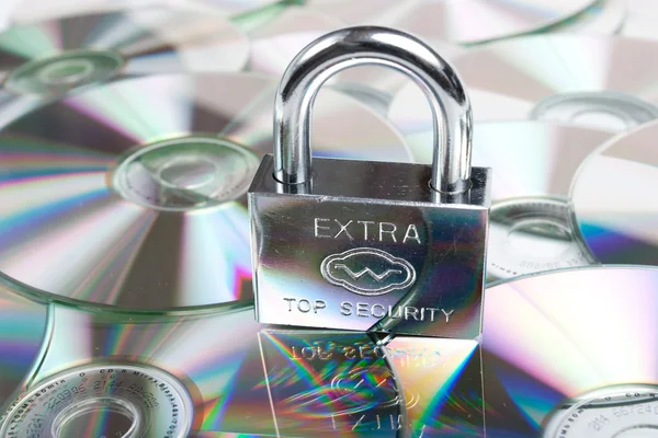 CD and dvd with padlock — Stock Photo, Image