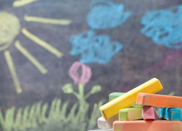 Color chalk with kid picture — Stock Photo, Image