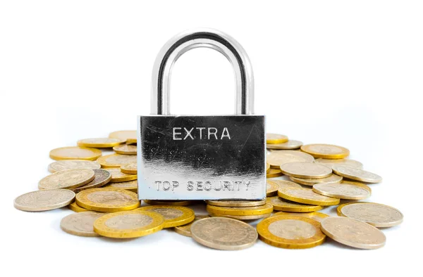 Pad lock on pile of coins — Stock Photo, Image