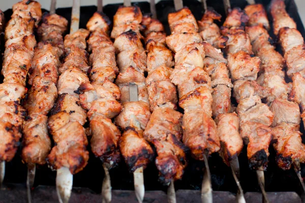 Meat with sauce on fire — Stock Photo, Image