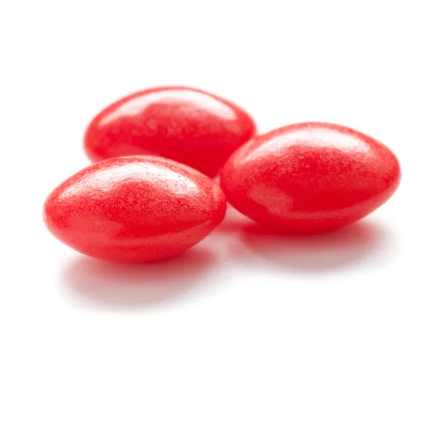 Red pills on white — Stock Photo, Image