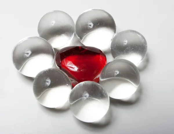 Glas hjärta och bollar — Stockfoto