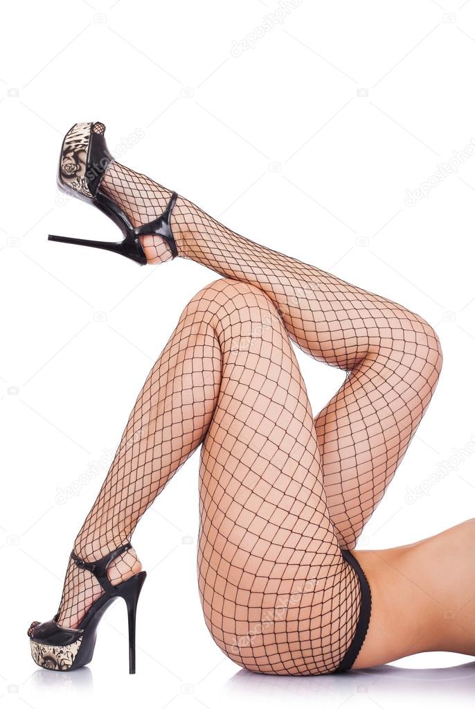 Sexy female legs in net stockings