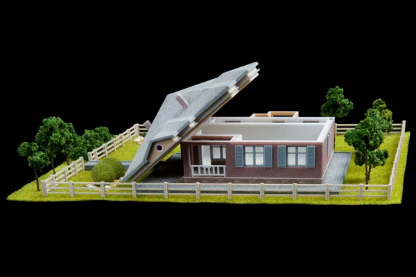 Modello di una casa di campagna su sfondo nero — Foto Stock