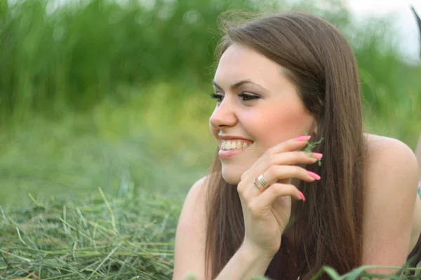 Girl on the grass — Stock Photo, Image