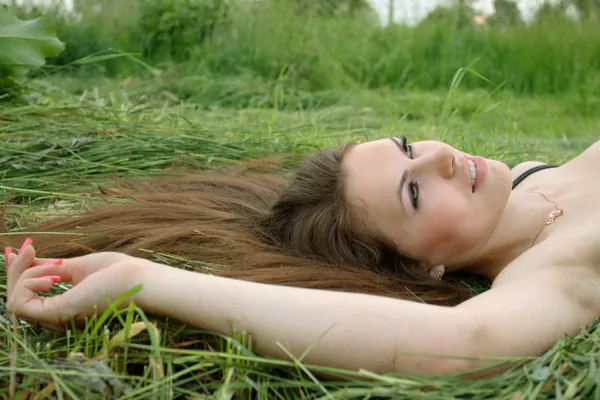 Girl on the grass — Stock Photo, Image