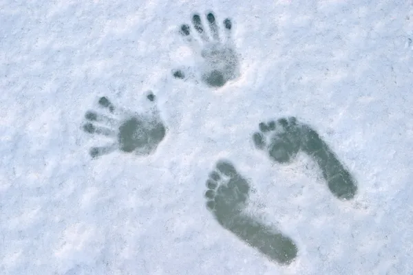 Abdruck menschlicher Füße und Handflächen — Stockfoto