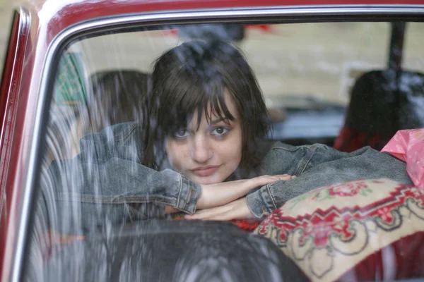 Girl in the car — Stock Photo, Image